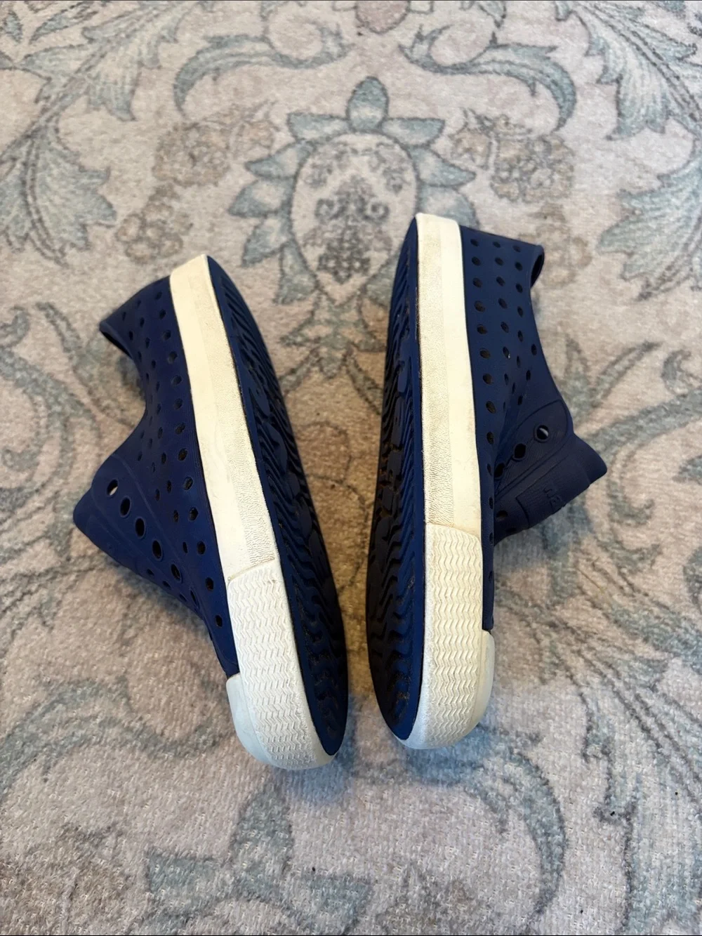 Navy blue boys Native shoes.